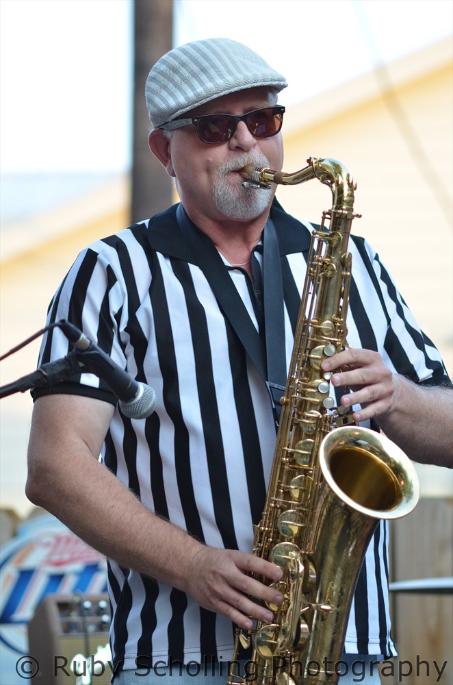 Picture of Paul Maine playing the saxophone